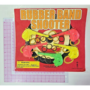 Vintage Vending Display Board Rubber Band Shooter 0671